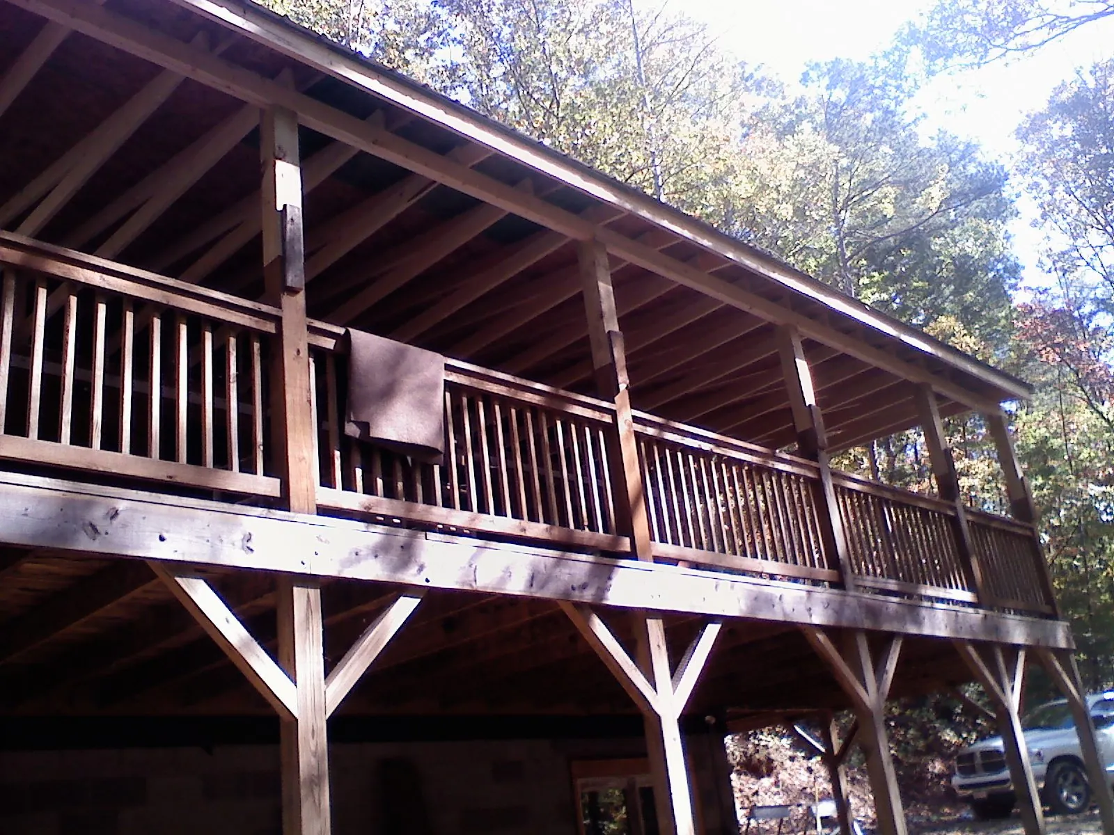 Timber framing under a new elevated porch and deck — Roof Leak Repair in Dixie by Roofing Brothers